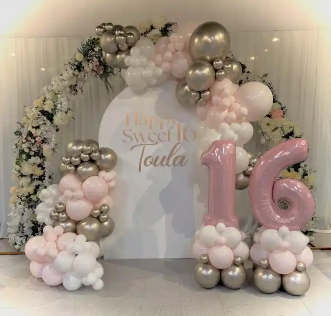 Blush and Chrome Balloon Arch with Floral Accents