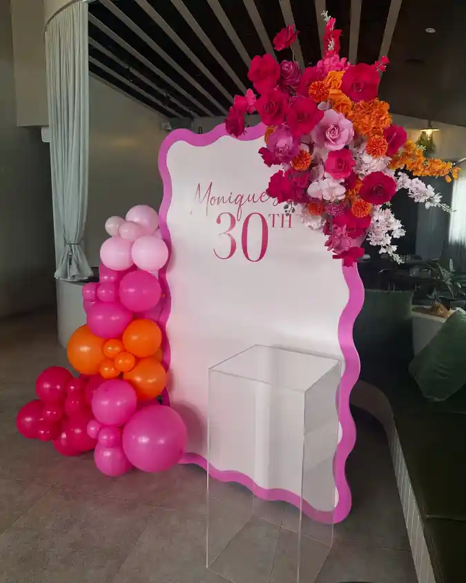 Custom Backdrop and Vibrant Balloon Arch