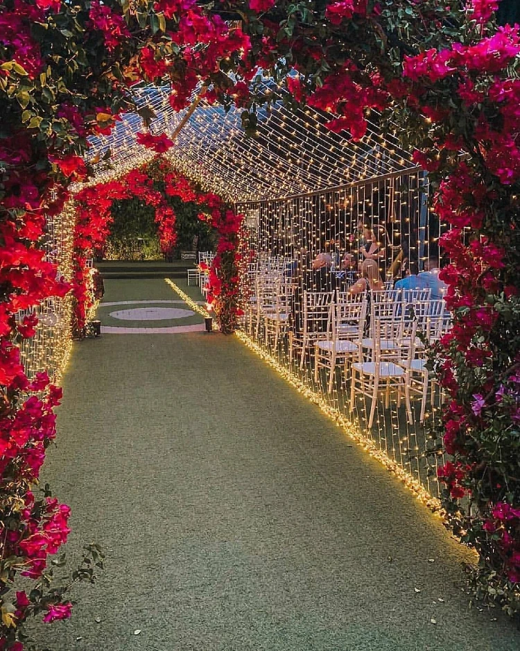 Enchanted Bougainvillea and Fairy Light Tunnel for an Unforgettable Garden Soiree