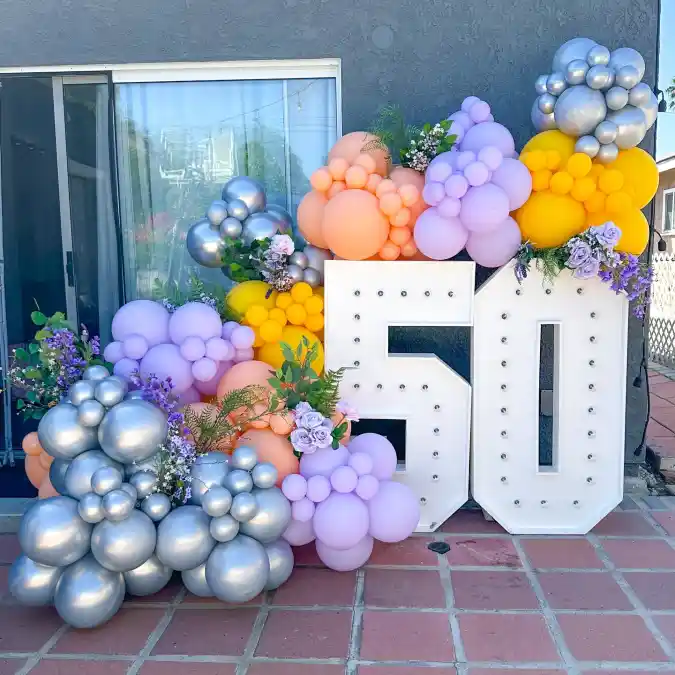 Half a Century Marquee and Balloon Backdrop