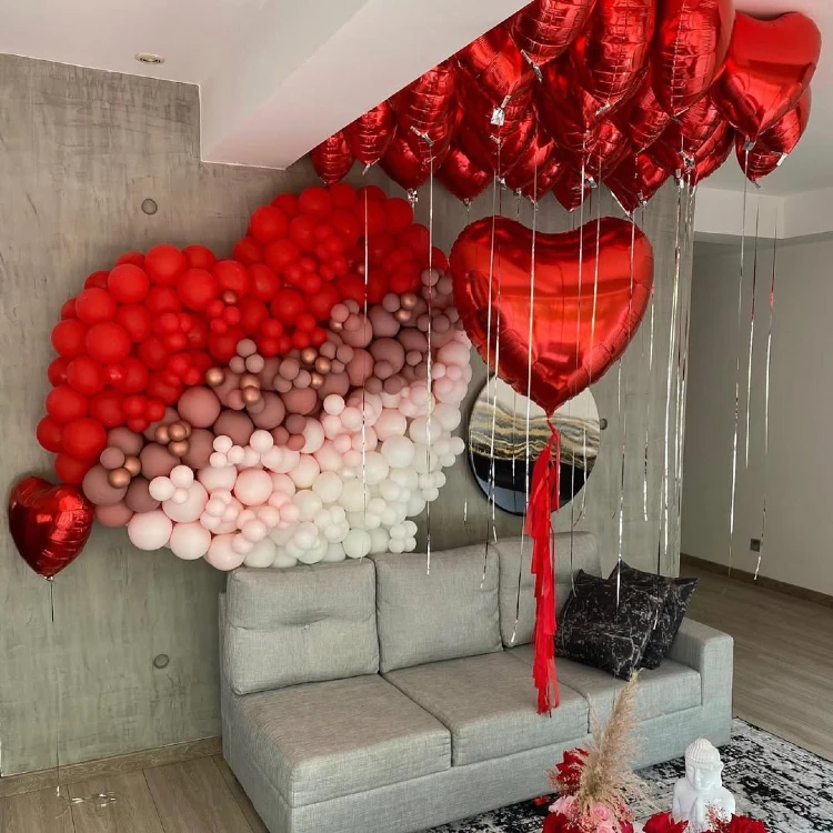 Ombre Red and Blush Balloon Heart Wall for a Chic Lounge Area