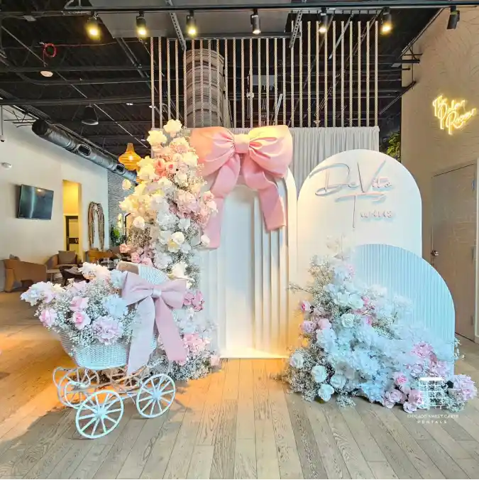 Oversized Bow and Carriage Backdrop