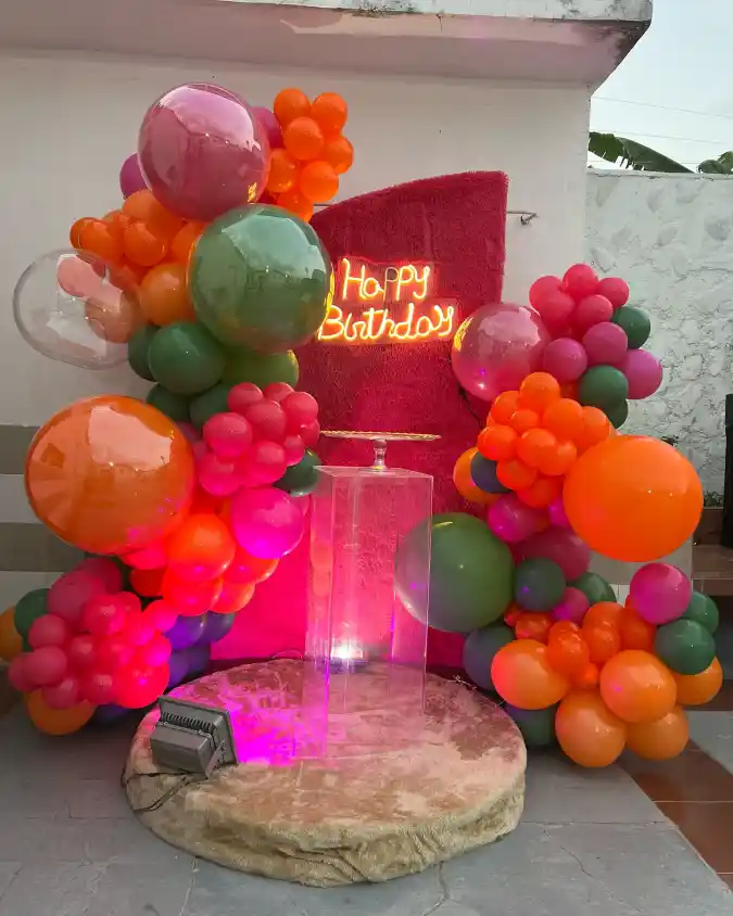 Vibrant Tropical Balloon Garland with Neon Sign