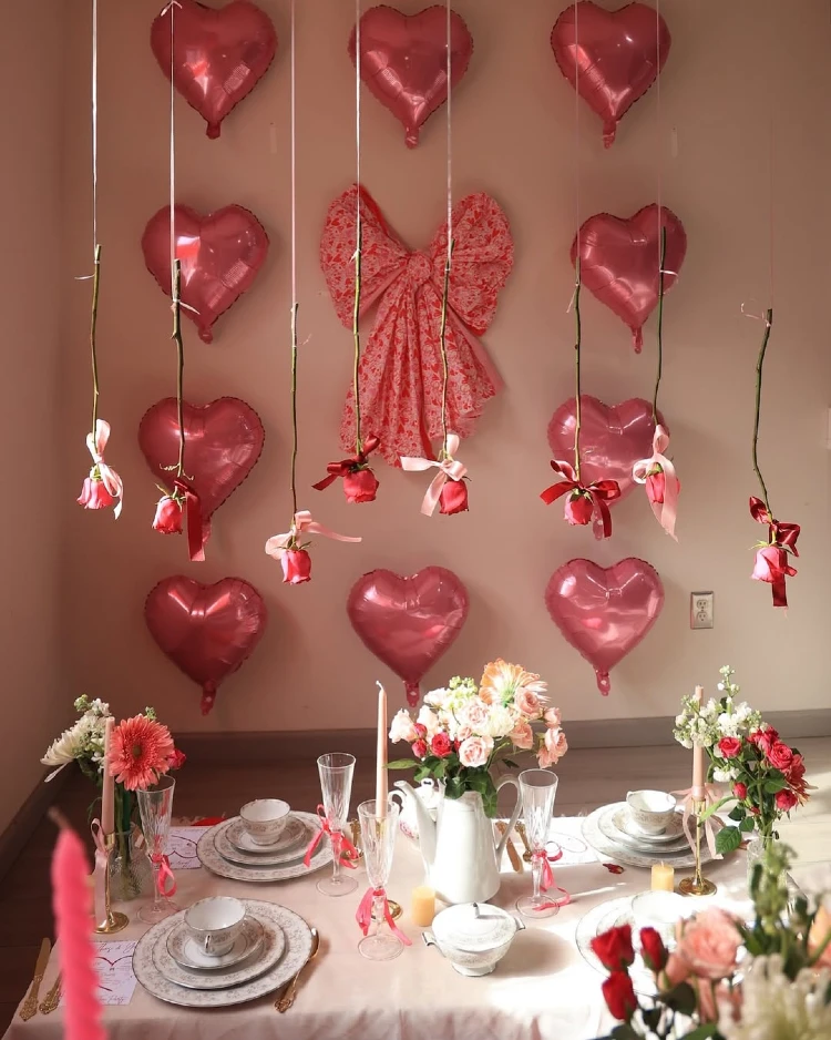 Whimsical Rose-Draped Balloon Backdrop for an Elegant Tea Party