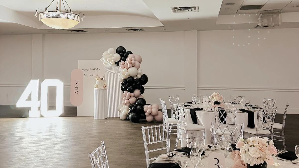 15. Chic Black and Blush Cake Setup