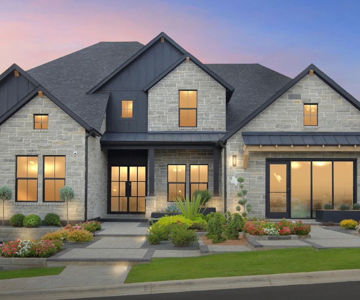 Grey Stone and Black Siding Estate