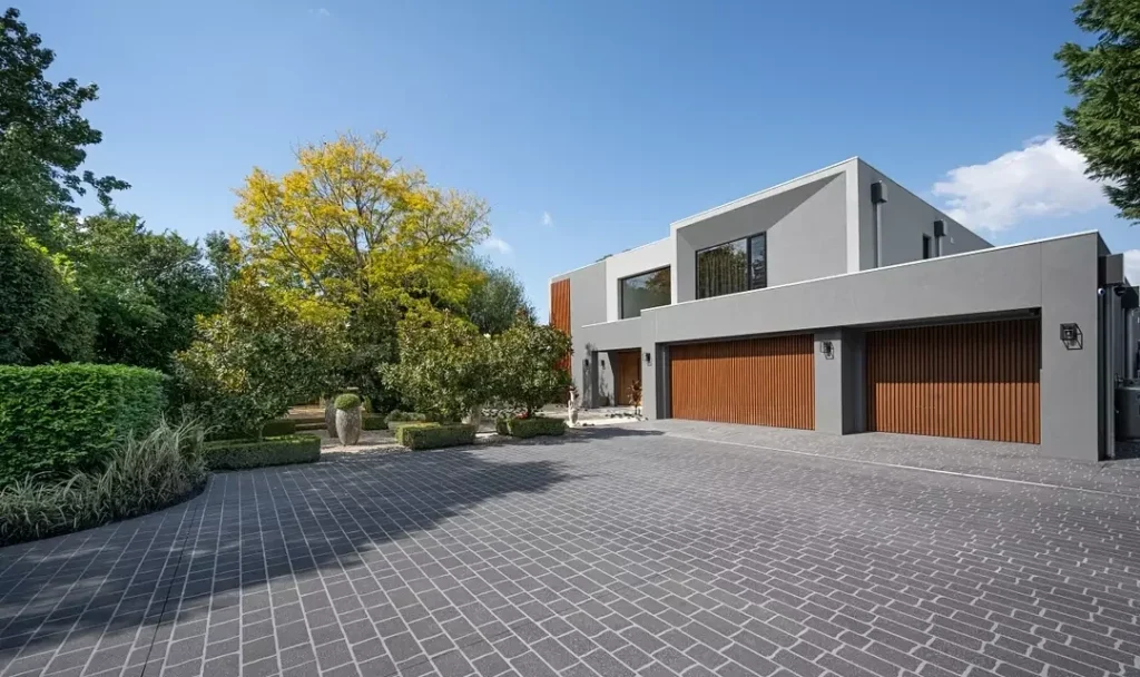 Sleek Grey Stucco and Warm Wood