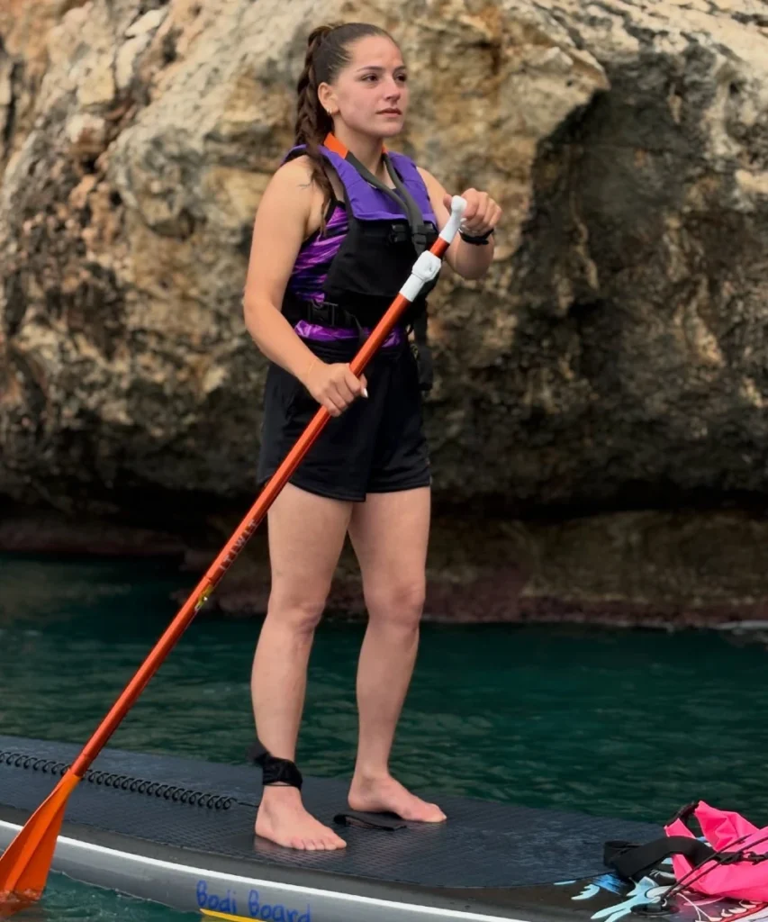 Purple Tank Top and Black Shorts with Life Vest