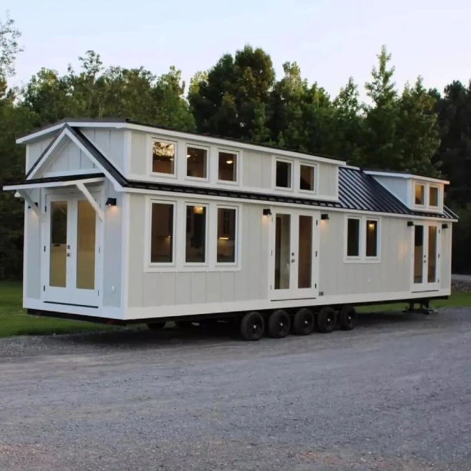White Tiny Home with Loft Windows