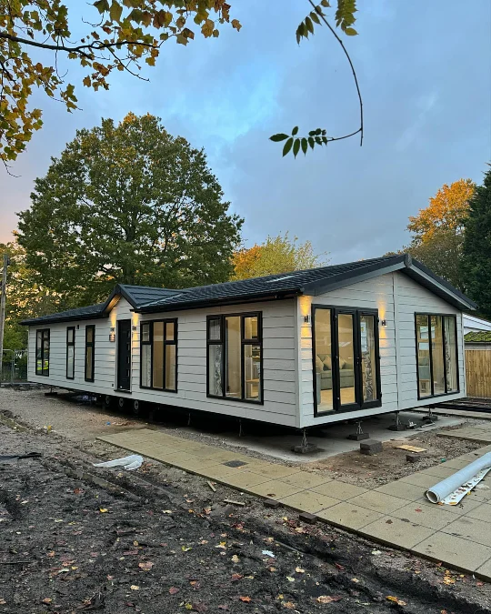White Mobile Home with Black Framing