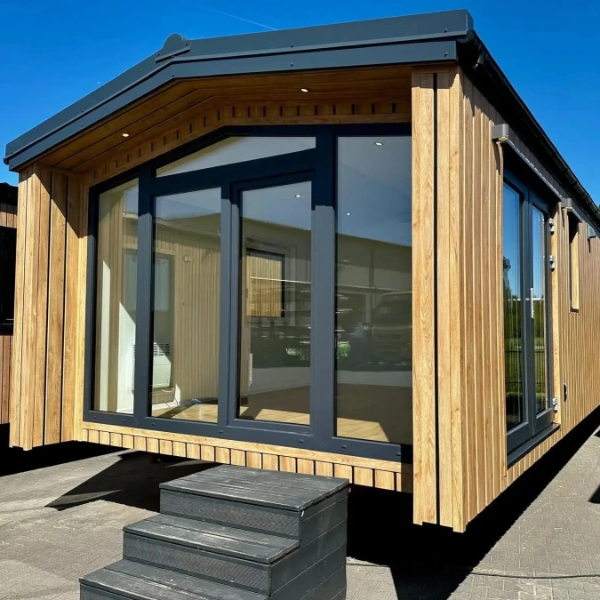 Natural Wood Mobile Home with Full Height Glass