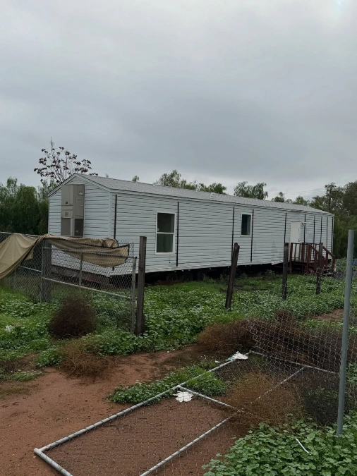 Simple Silver Mobile Home on a Rural Plot